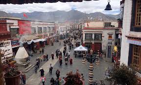 Tibetans circumambulating the Jokhang temple in Lhasa. Photo- Access Tibet Tour