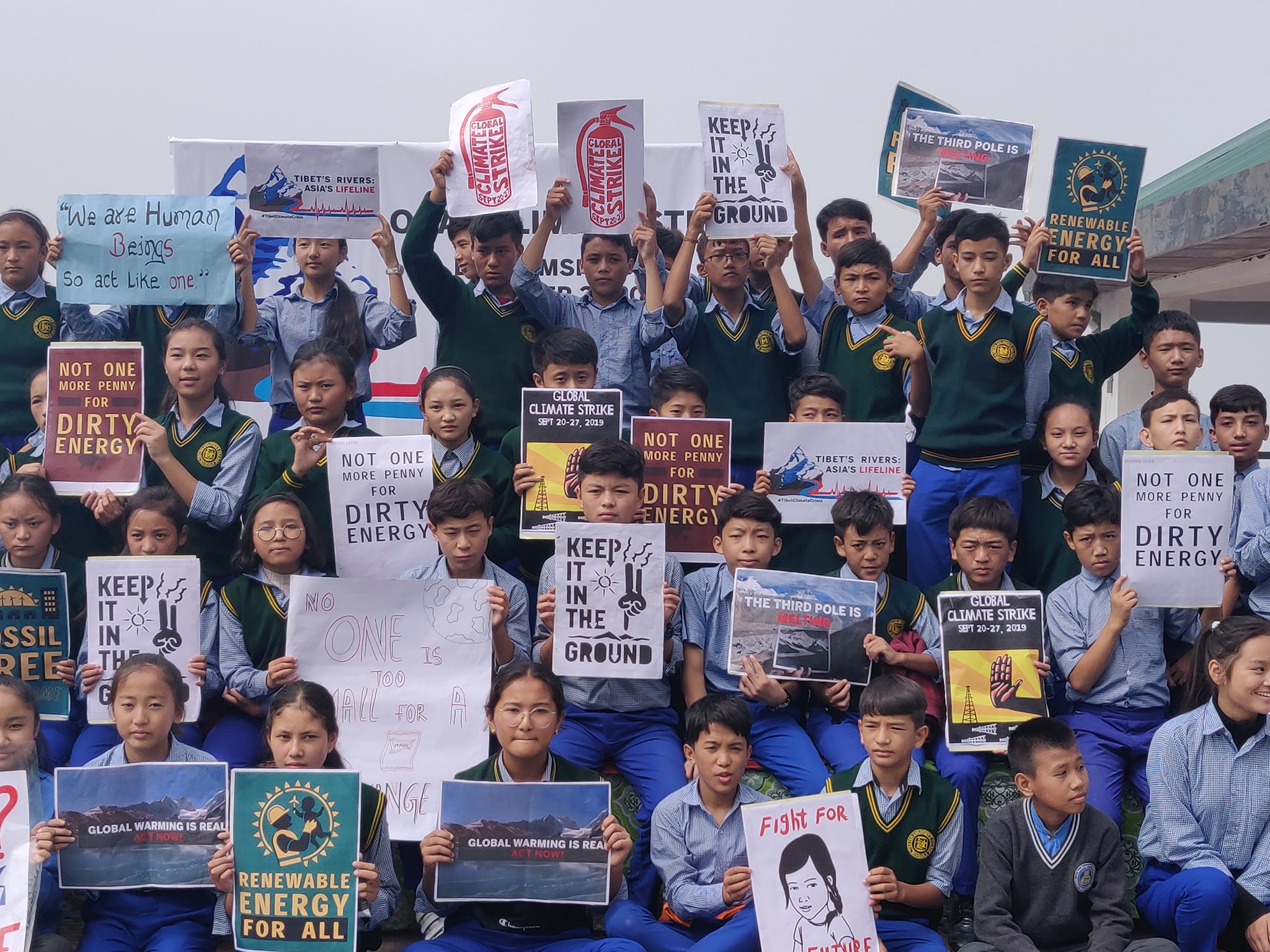 Tibetan highschoolers chime in the strike for climate action at McLeod Ganj, Dharamshala. Sept. 27, 2019. Phayul photo