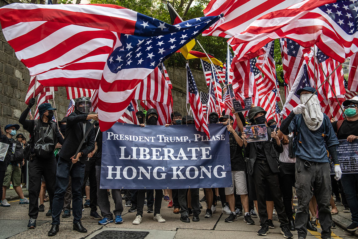 Anti-government protestors on the streets of Hong Kong carrying the American flag on Oct. 14, 2019. Photo- politco.com