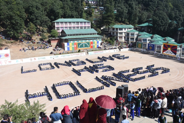 TCV students pray for the long life of the Tibetan leader His Holiness through display of calisthenics. Dharamshala, Oct. 23, 2019. Phayul photo- Kunsang Gashon.