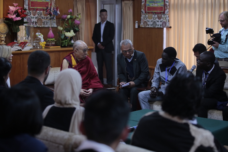 His Holiness listening keenly to personal stories at the forth dialogue with youth peacebuilders at his residence on Wednesday. Photo by Abhishek Madhukar