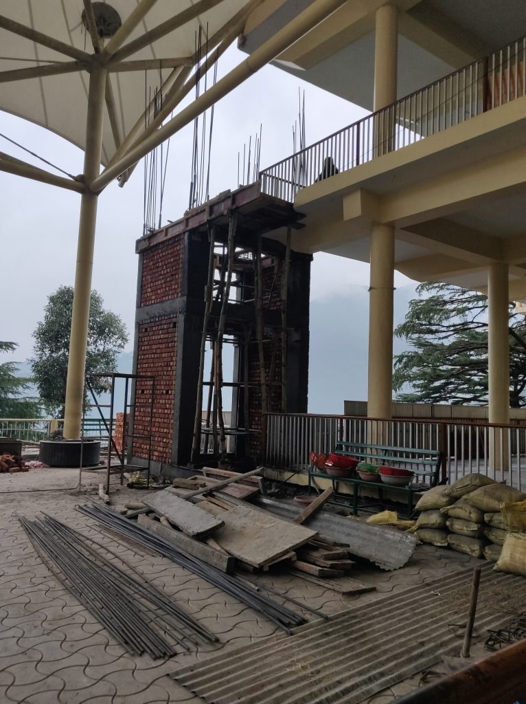 Construction underway for the maiden elevator at Tsuglakhang temple in Dharamshala. October 2, 2019. Phayul photo