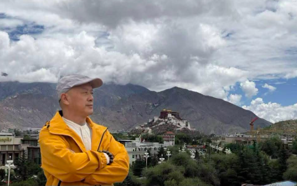 Chinese pro-democracy activist detained for possessing Dalai Lama photo