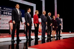 Democratic Presidential hopefuls at a debate in LA on Dec 19 (bloomberg)