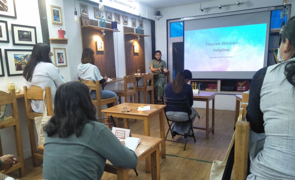 Helpline staff Samkar Dolma answers questions from the audience on Thursday (Phayul photo)