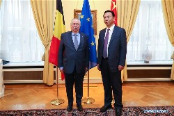 Norbu Dondrup (R) and Andre Flahaut in Brussels on Dec 12 2019 (Xinhua)