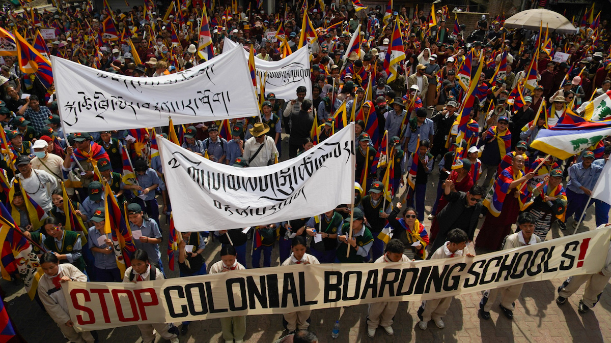 Thousands rally in Dharamshala on Uprising Day, limited participation of exile leadership in protest rally questioned